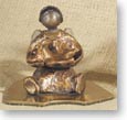 Angel (sitting)